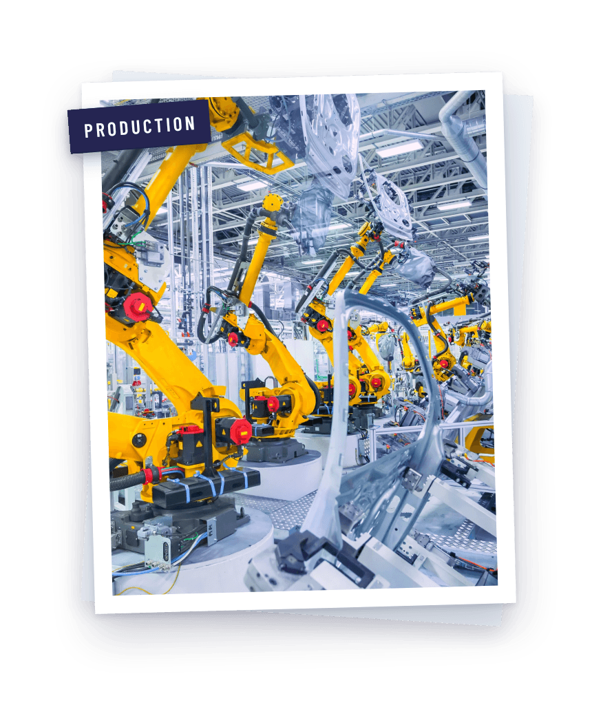 Yellow robot arms in a production hall