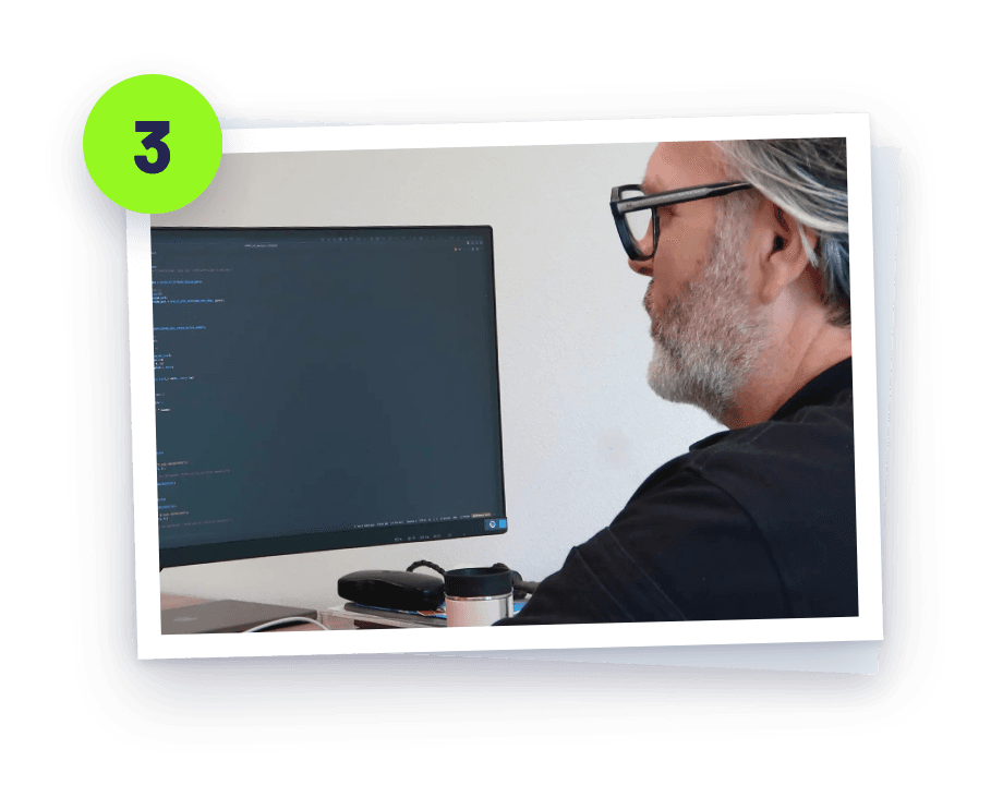 A developer at work behind a screen